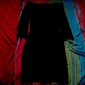 A black off the shoulder dress